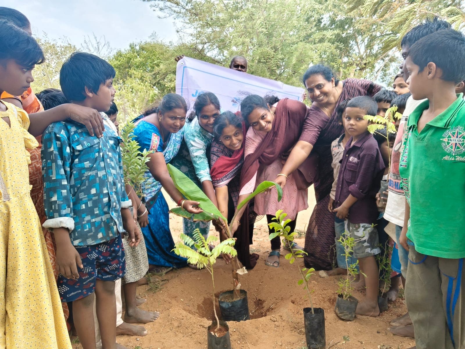 Volunteers helping children